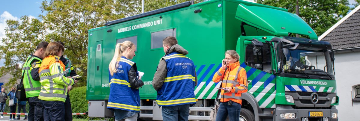 Medewerkers bij Mobiele Commando Unit (MCU)
